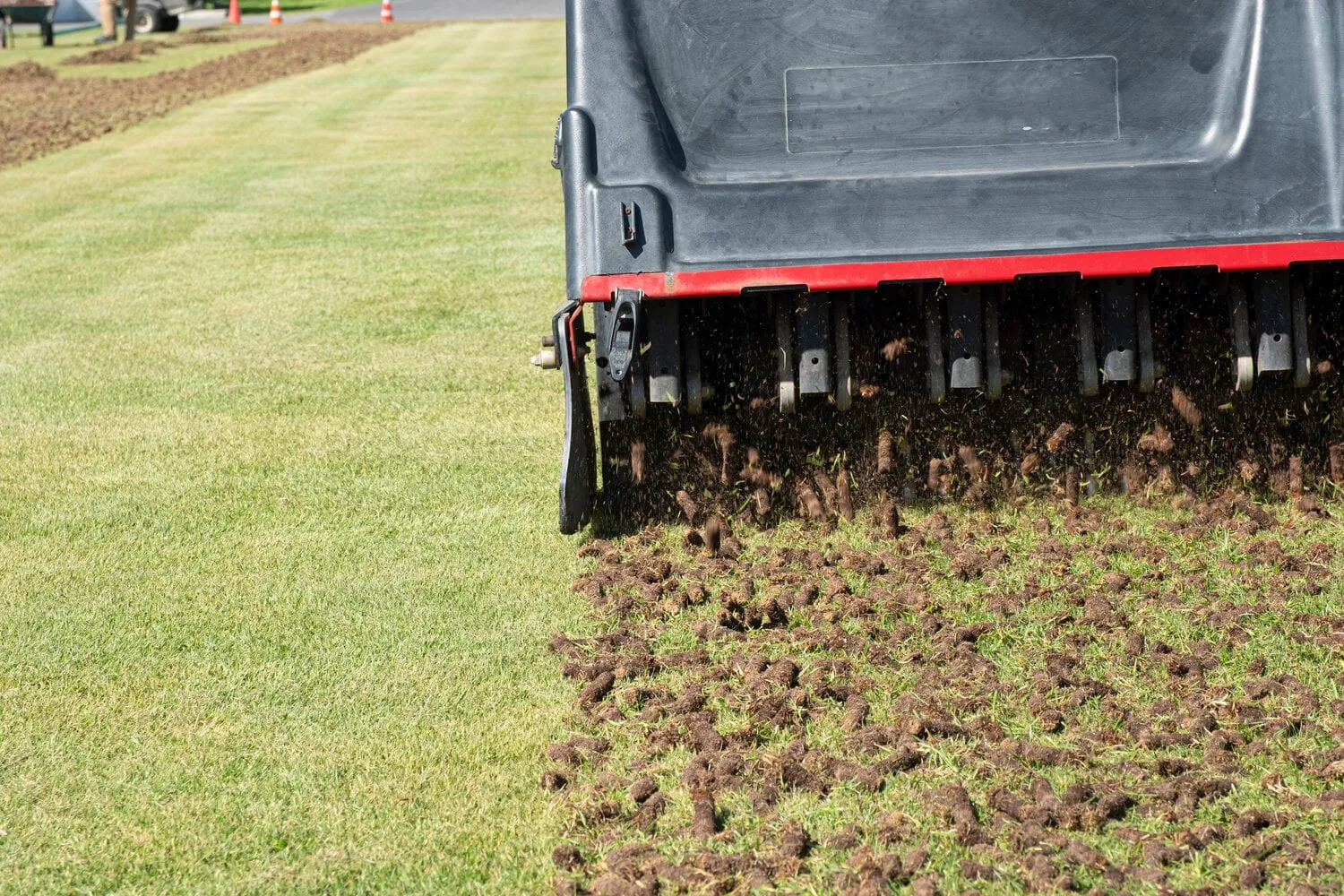 pile,of,plugs,of,soil,removed,from,sports,field.,waste